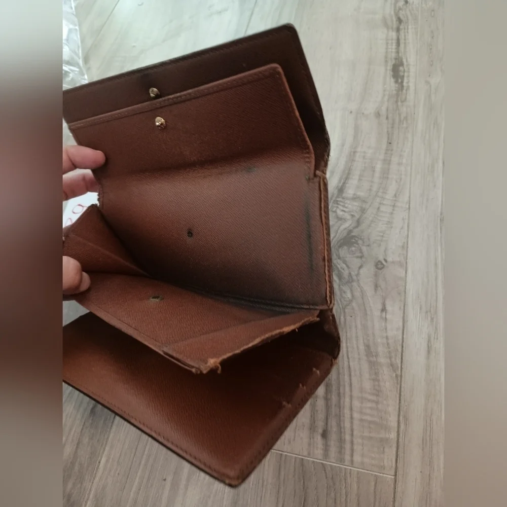 Authentic LOUIS VUITTON Monogram Porte Tresor International Trifold Wallet